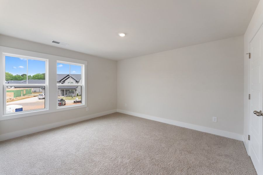 Representative unfurnished interior of a home built from the MacGregor I by Hunter Quinn Homes in Eagle Creek, Central (Image 13).