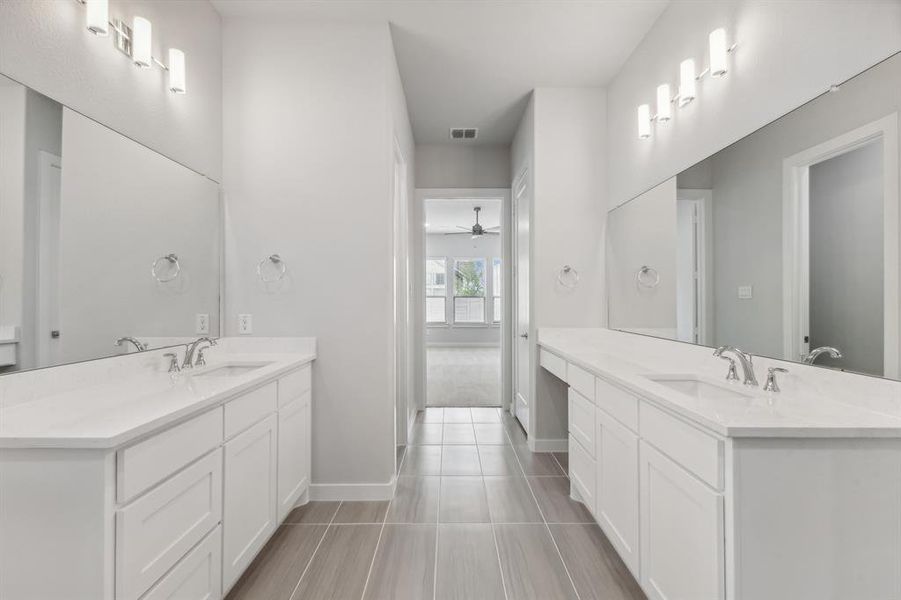 Primary Bathroom in the Matisse home plan by Trophy Signature Homes – REPRESENTATIVE PHOTO
