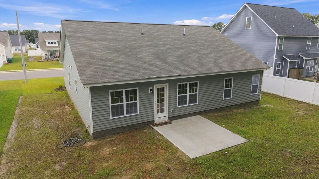 Exterior details and patio area of a home in Davenport Farms, Winterville (Image 23).