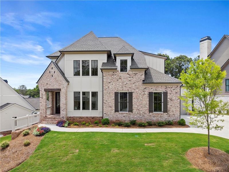 Front exterior of a new home in , Marietta, GA, highlighting curb appeal (Image 1). Front exterior of a new home in , Marietta, GA, highlighting curb appeal (Image 1).