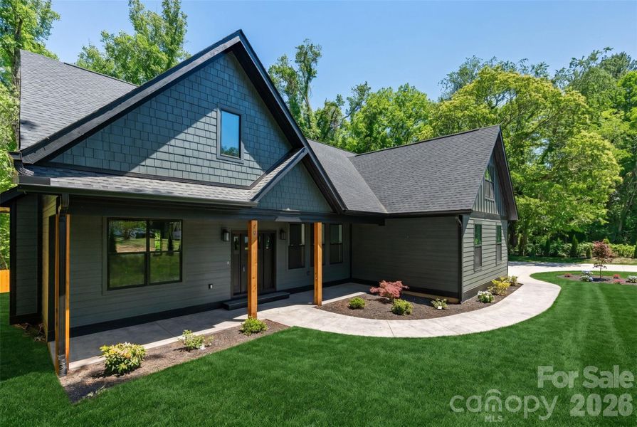 Front exterior of a new home in , Asheville, NC, highlighting curb appeal (Image 30).