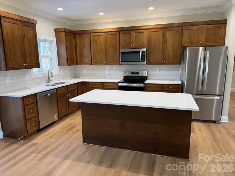 Furnished interior view inside a new home in , Statesville (Image 4).