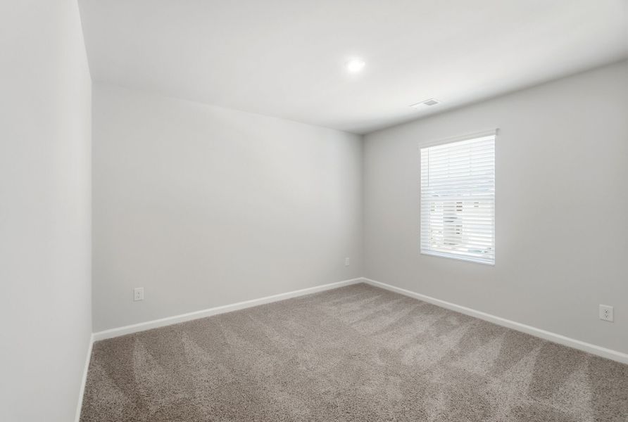 Spacious, unfurnished interior of a new home in Stonesummit at Reedy Creek, Charlotte (Image 19).