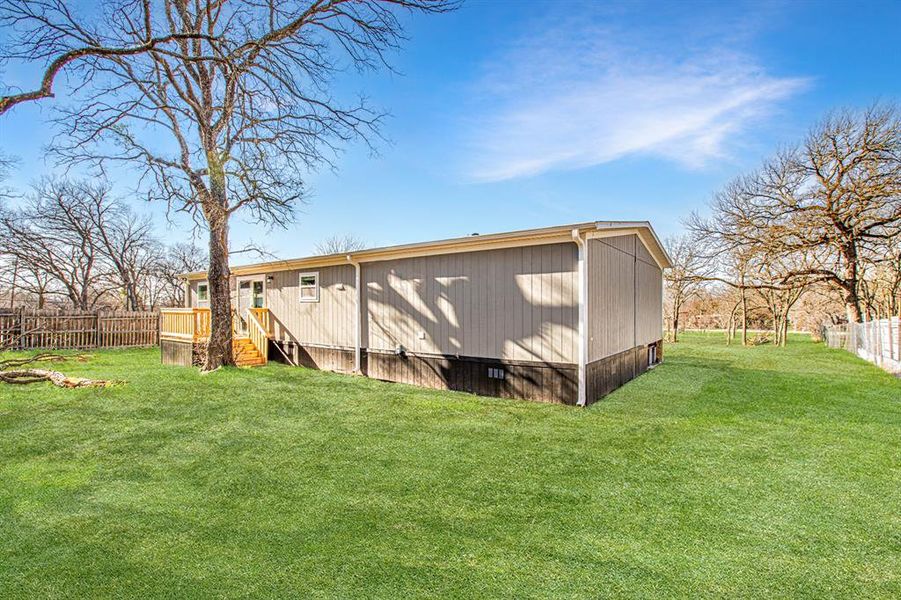 Front exterior of a new home in , Azle, TX, highlighting curb appeal (Image 2). Front exterior of a new home in , Azle, TX, highlighting curb appeal (Image 2).