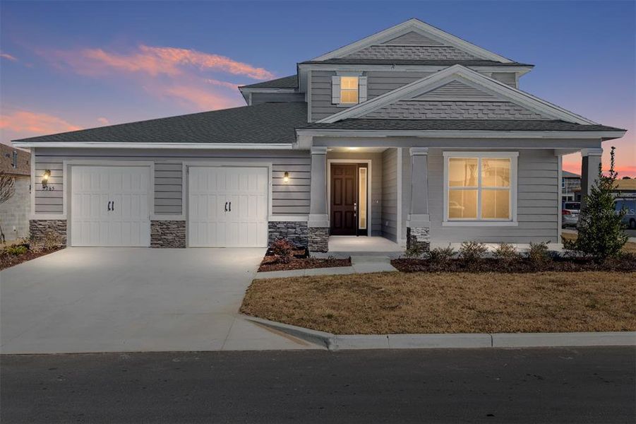 Front exterior of a new home in Calesa Township, Ocala, FL, highlighting curb appeal (Image 21).