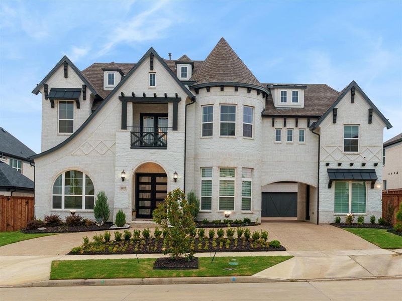 Two-story architectural design featuring a prominent turret and white brick facade Two-story architectural design featuring a prominent turret and white brick facade
