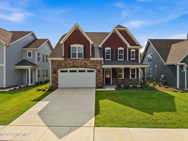 Front exterior of a new home in Legacy Lakes, Aberdeen, NC, highlighting curb appeal (Image 2).