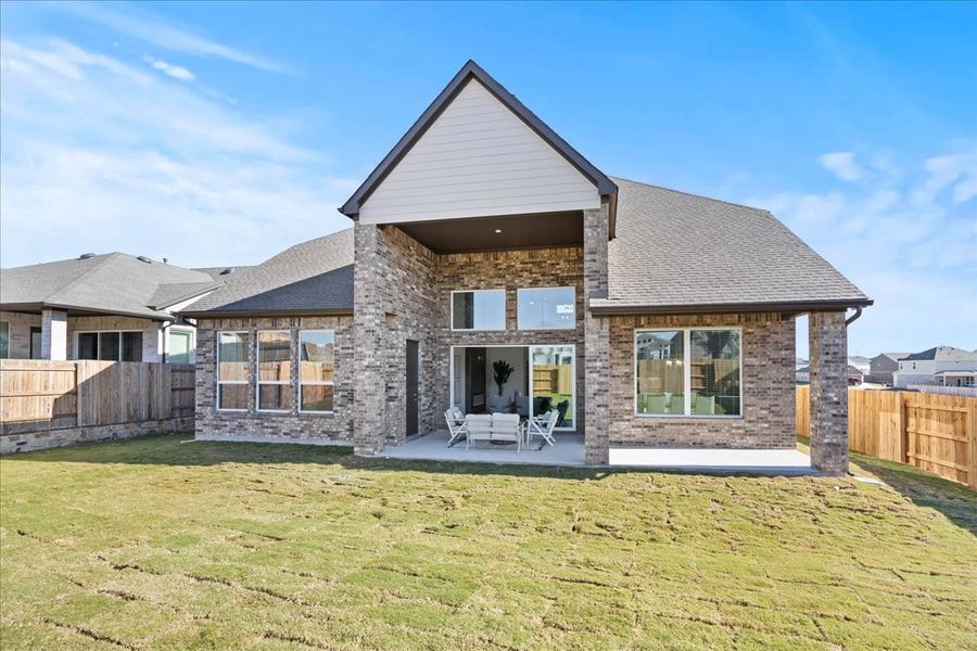 Exterior details and patio area of a home in Sunfield, Buda (Image 26).
