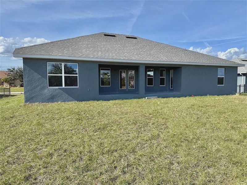 Exterior details and patio area of a home in South Gulf Cove, Port Charlotte (Image 3).