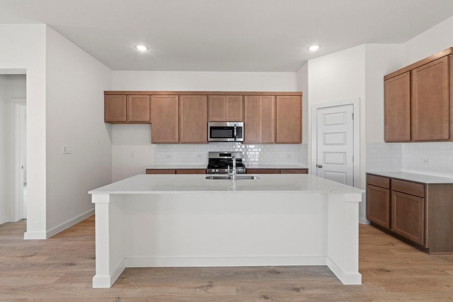 Furnished interior view inside a new home in Prairie Winds, Hutto (Image 6).