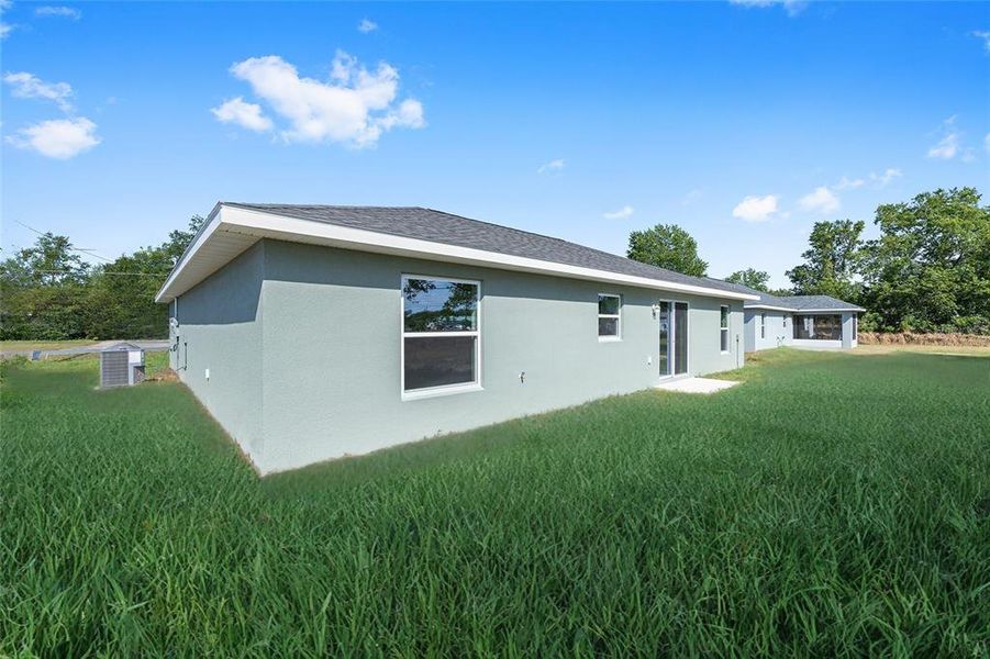 Exterior details and patio area of a home in , Ocklawaha (Image 2).