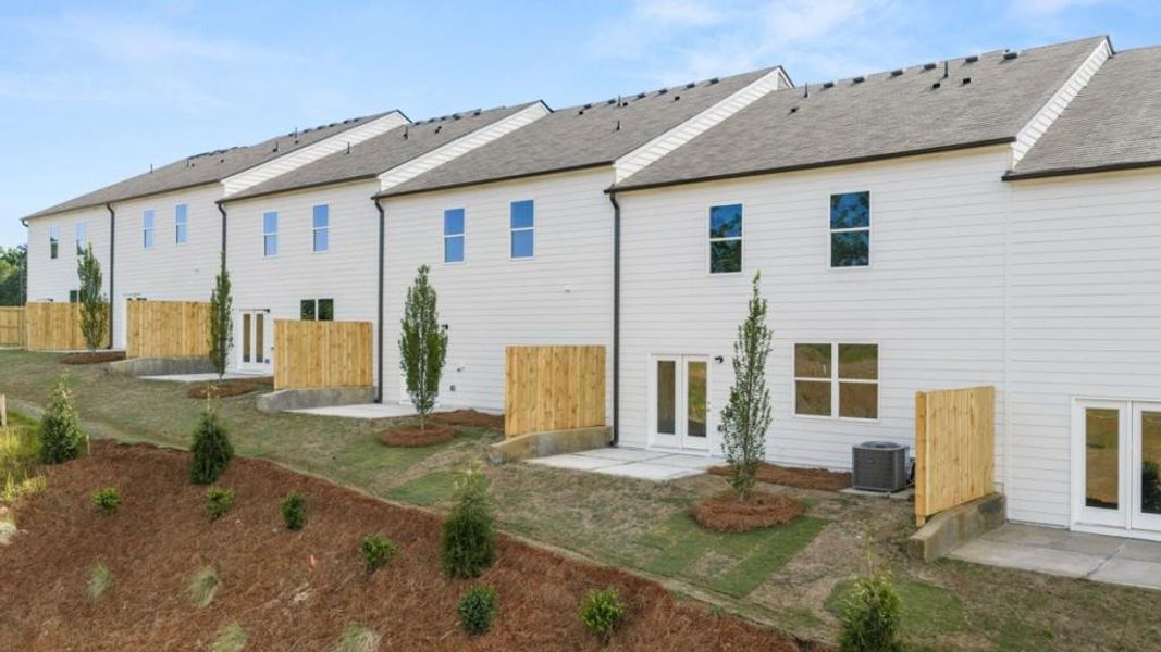 Exterior details and patio area of a home in Village at Pine Valley, Gainesville (Image 4).