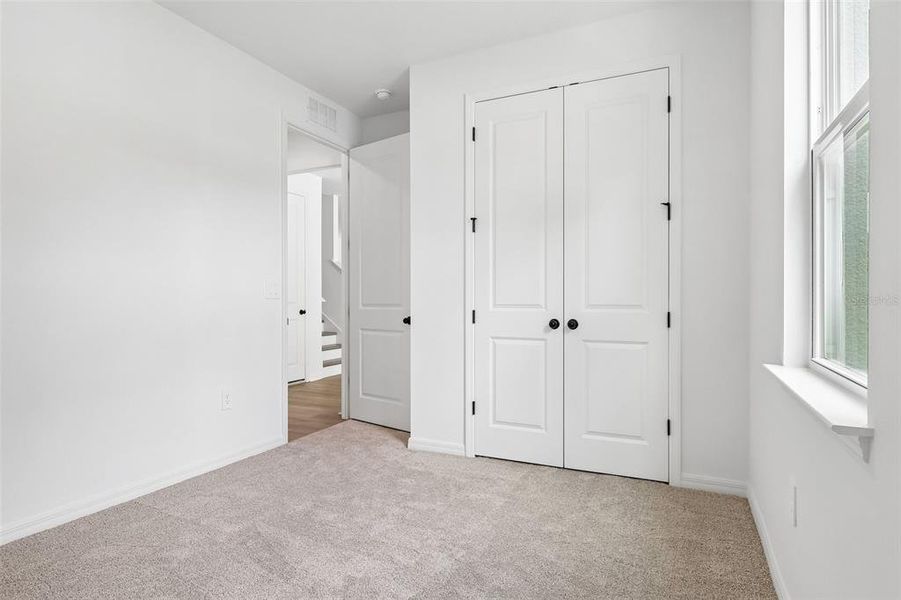 Spacious, unfurnished interior of a new home in Estes Reserve, Eustis (Image 25). Spacious, unfurnished interior of a new home in Estes Reserve, Eustis (Image 25).