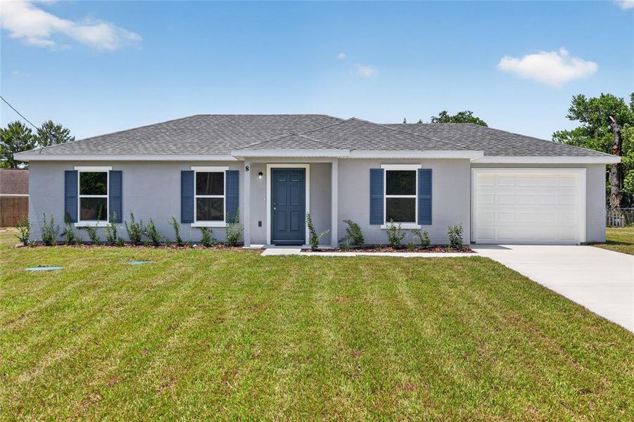 Front exterior of a new home in , Ocala, FL, highlighting curb appeal (Image 18). Front exterior of a new home in , Ocala, FL, highlighting curb appeal (Image 18).