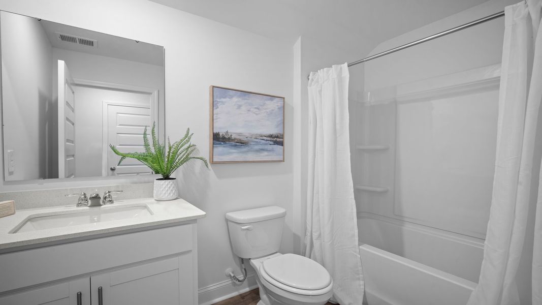 Representative furnished interior of a home built from the Cantey-exp by D.R. Horton in The Lakes at North Glynn, Brunswick (Image 28).