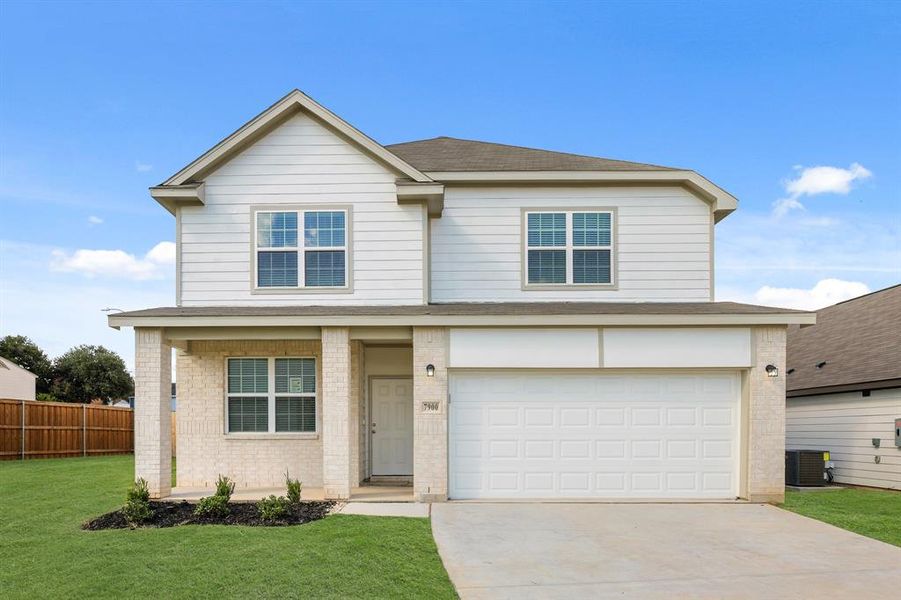 Front exterior of a new home in Sycamore Landing, Fort Worth, TX, highlighting curb appeal (Image 1). Front exterior of a new home in Sycamore Landing, Fort Worth, TX, highlighting curb appeal (Image 1).