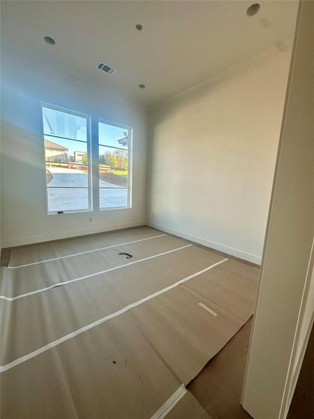 Empty room with baseboards and ornamental molding Empty room with baseboards and ornamental molding