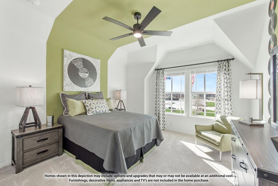 Bedroom with vaulted ceiling, green accent wall, ceiling fan, and large window with natural light Bedroom with vaulted ceiling, green accent wall, ceiling fan, and large window with natural light