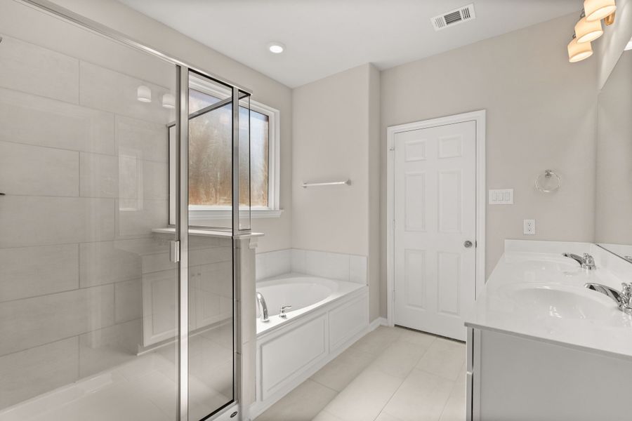 Primary bath. Note: Sample product photo - actual exterior and interior selections may vary by homesite