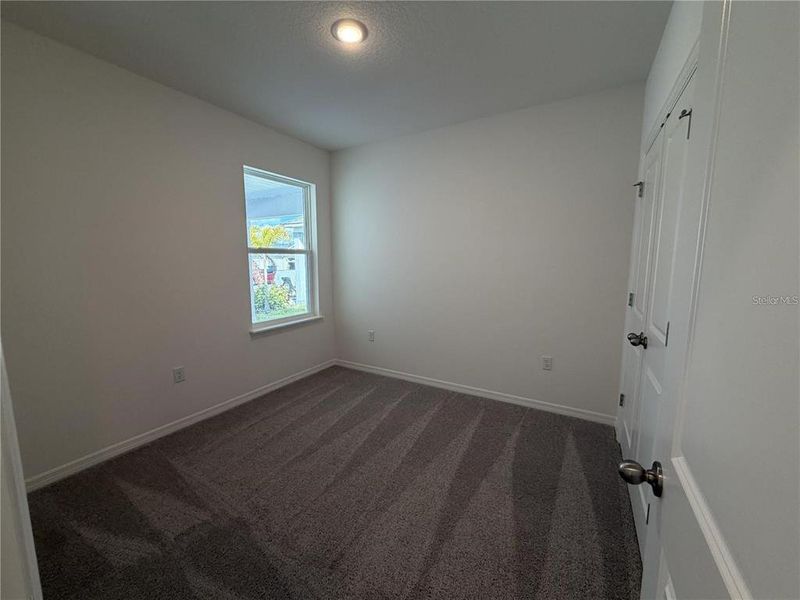 Spacious, unfurnished interior of a new home in Hammock Reserve, Haines City (Image 12).