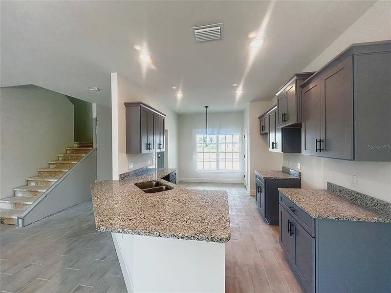 Furnished interior view inside a new home in Deep Creek, Punta Gorda (Image 5).