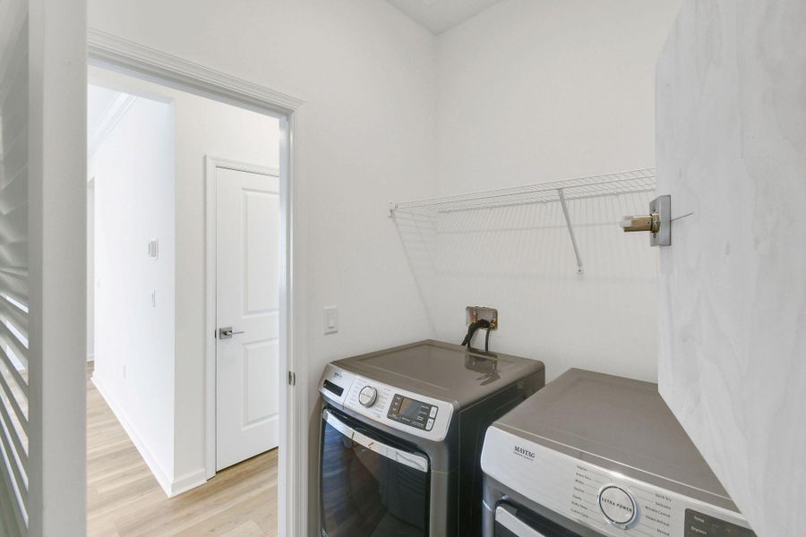 Front exterior of a new home in Costa Pointe, Vero Beach, FL, highlighting curb appeal (Image 20). Front exterior of a new home in Costa Pointe, Vero Beach, FL, highlighting curb appeal (Image 20).