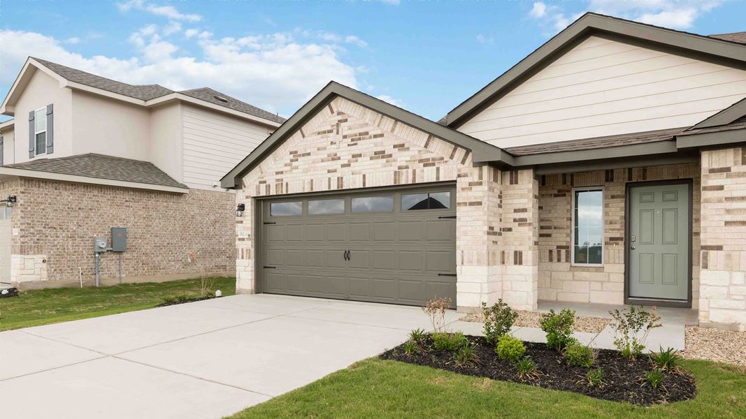 Front exterior of a new home in Palomino, Manor, TX, highlighting curb appeal (Image 16).