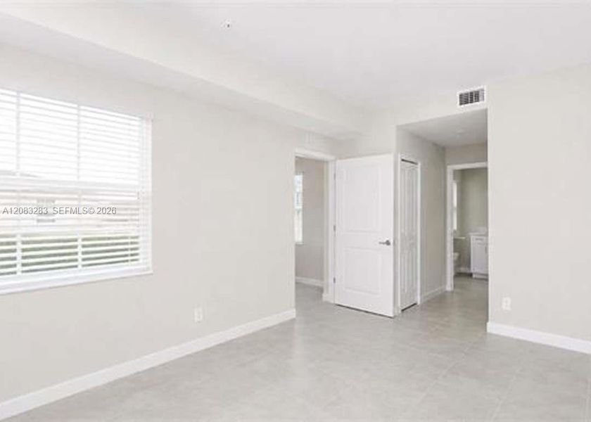 Spacious, unfurnished interior of a new home in , Ave Maria (Image 12).