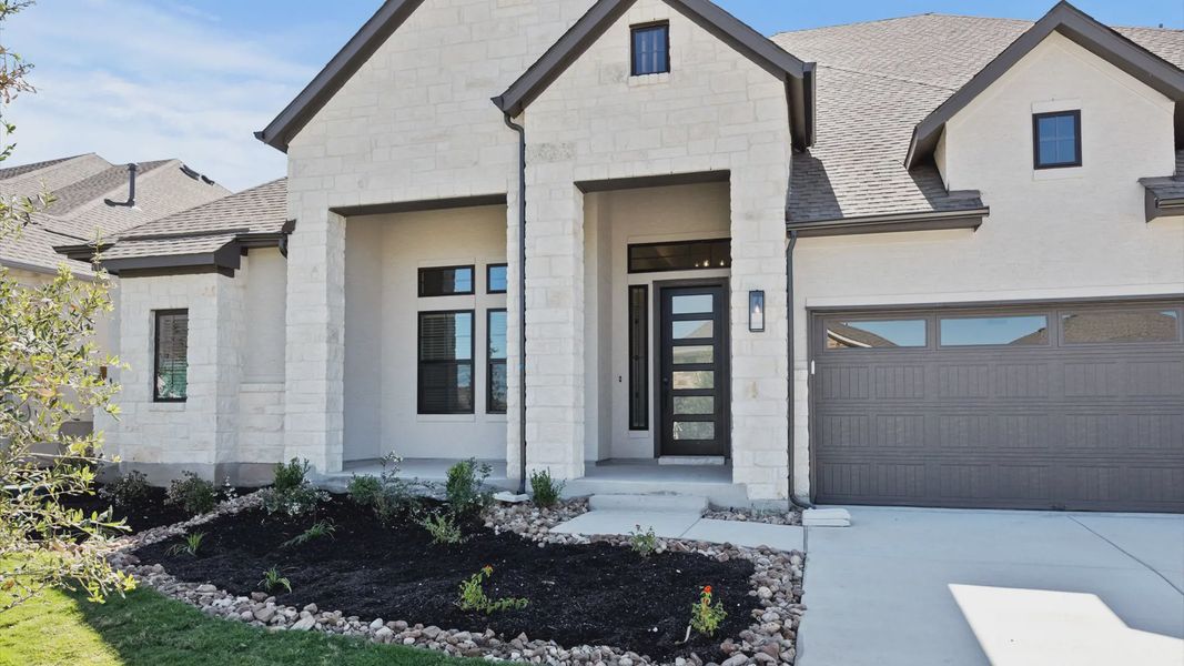 Representative exterior details of a home built from the Raegan by Chesmar Homes in Sweetwater, Austin (Image 3). Representative exterior details of a home built from the Raegan by Chesmar Homes in Sweetwater, Austin (Image 3).