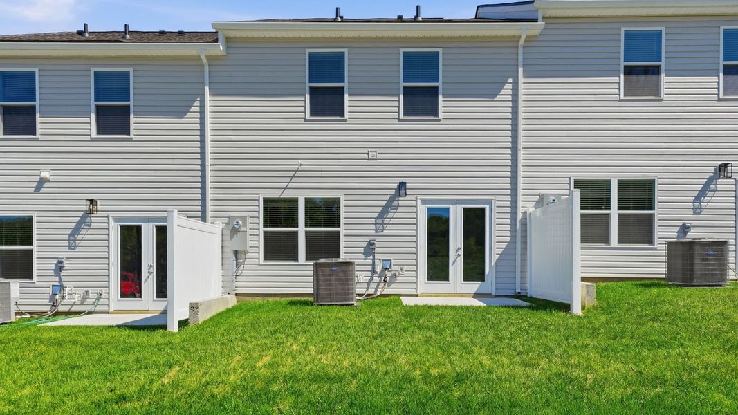 Exterior details and patio area of a home in The Arbor Townhomes, Kingsport (Image 17). Exterior details and patio area of a home in The Arbor Townhomes, Kingsport (Image 17).