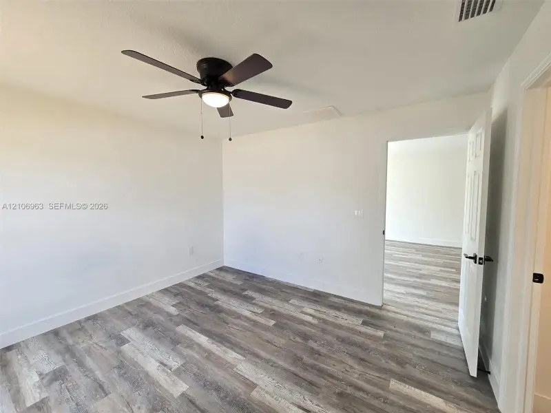 Spacious, unfurnished interior of a new home in , Port Charlotte (Image 20).