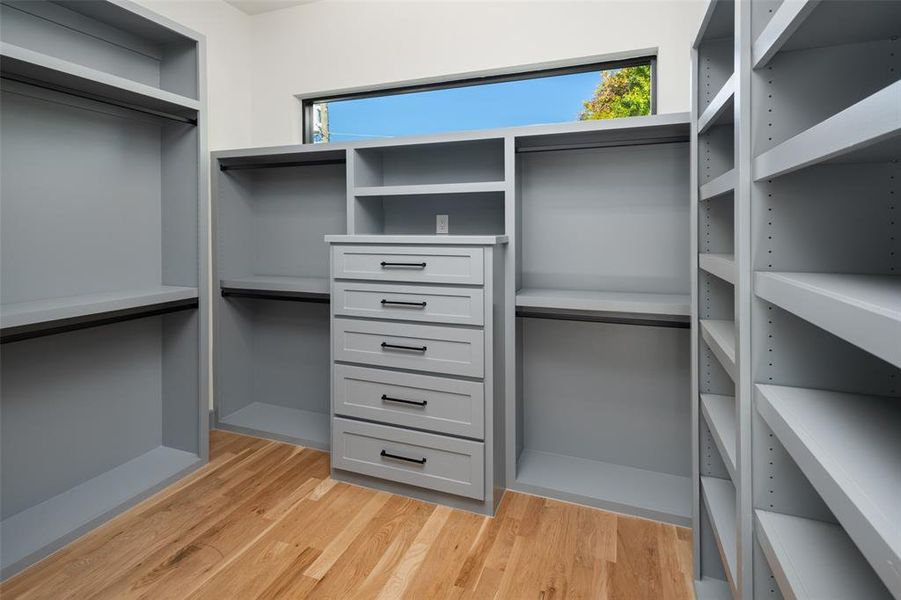 Walk in closet featuring light wood-type flooring