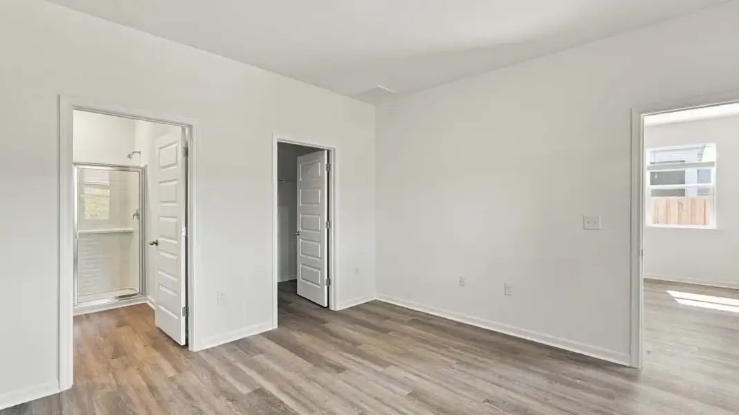 Spacious, unfurnished interior of a new home in The Lakes at North Glynn, Brunswick (Image 20).