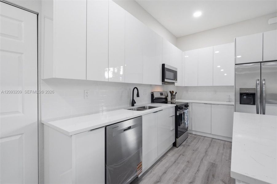 Furnished interior view inside a new home in , Lehigh Acres (Image 17).