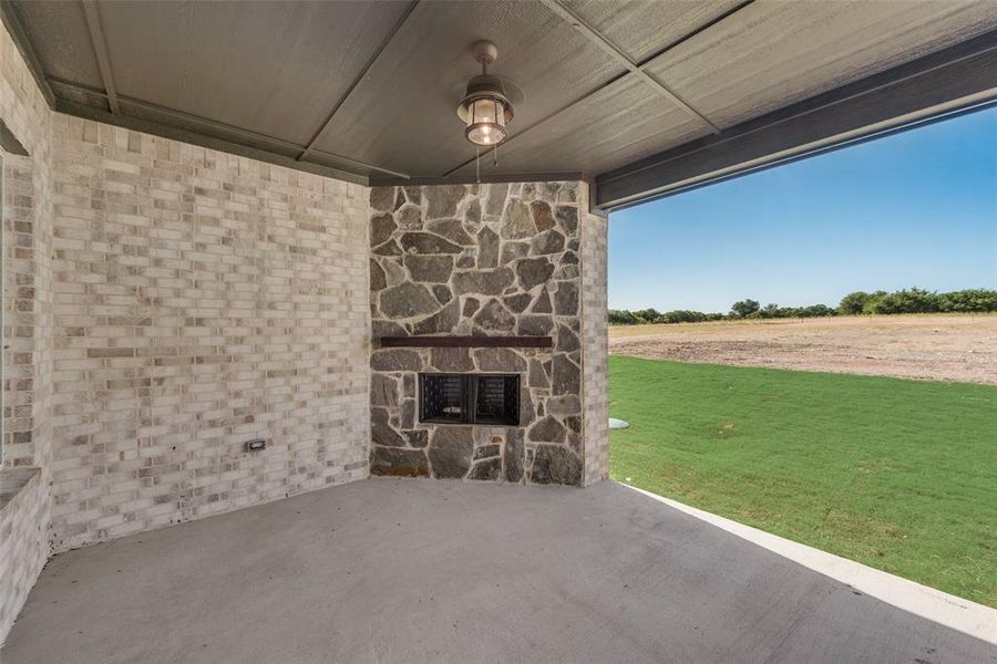 View of patio with a rural view