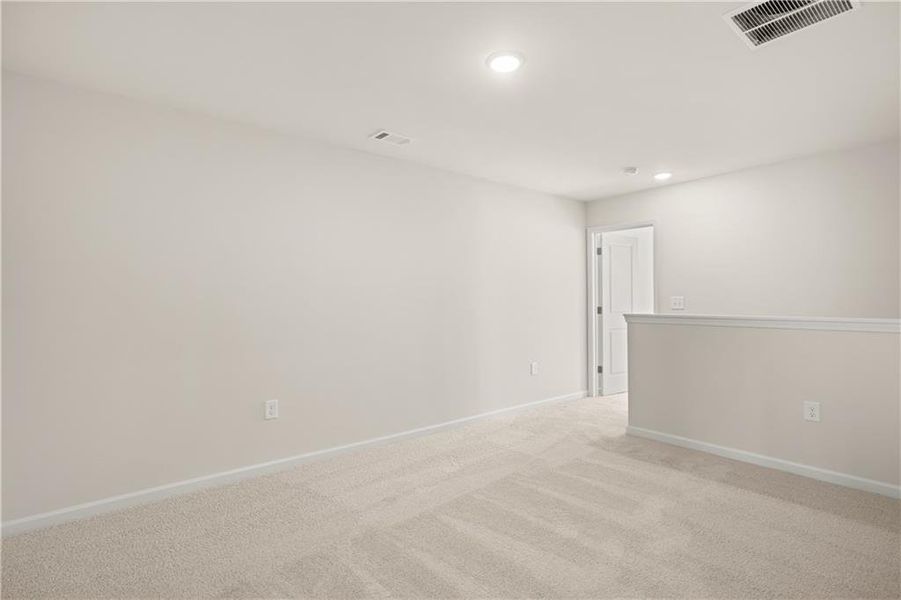 Spacious, unfurnished interior of a new home in Lake Carlton, Loganville (Image 21).
