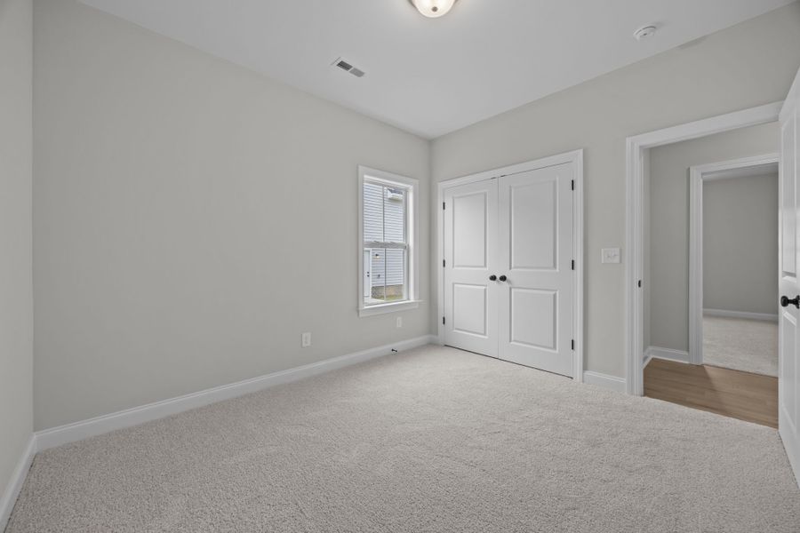 Spacious, unfurnished interior of a new home in The Preserve at Langston, Winterville (Image 48).