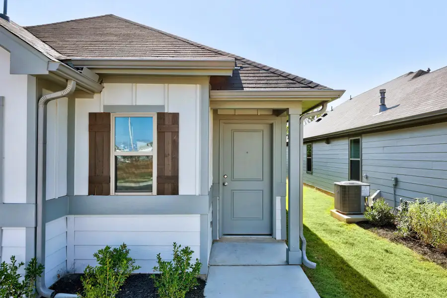 Exterior details and patio area of a home in Trinity Ranch, Elgin (Image 3).