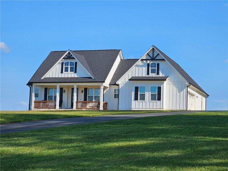 Front exterior of a new home in , Dallas, GA, highlighting curb appeal (Image 26).