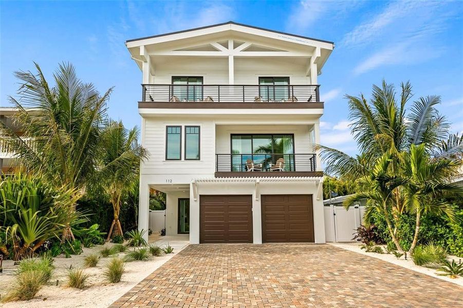 Front exterior of a new home in , Anna Maria, FL, highlighting curb appeal (Image 24).