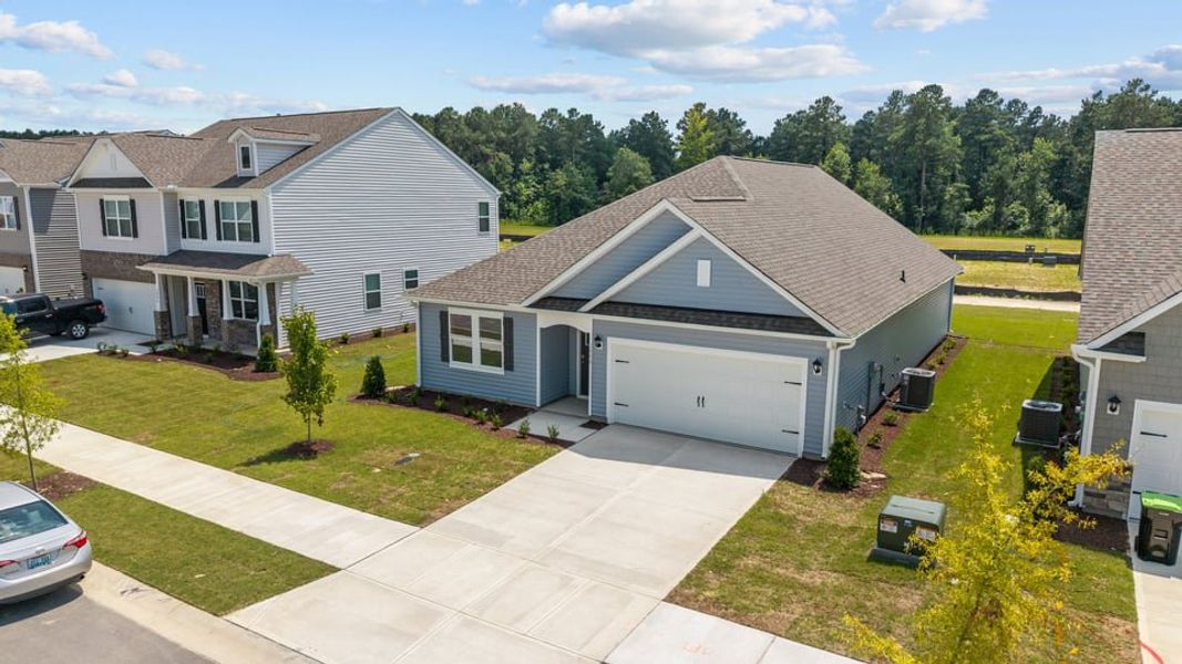 Front exterior of a new home in West New Bern, New Bern, NC, highlighting curb appeal (Image 17).