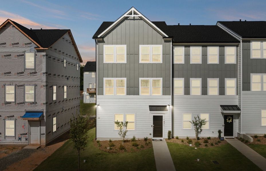 Front exterior of a new home in Huxley, Apex, NC, highlighting curb appeal (Image 1).
