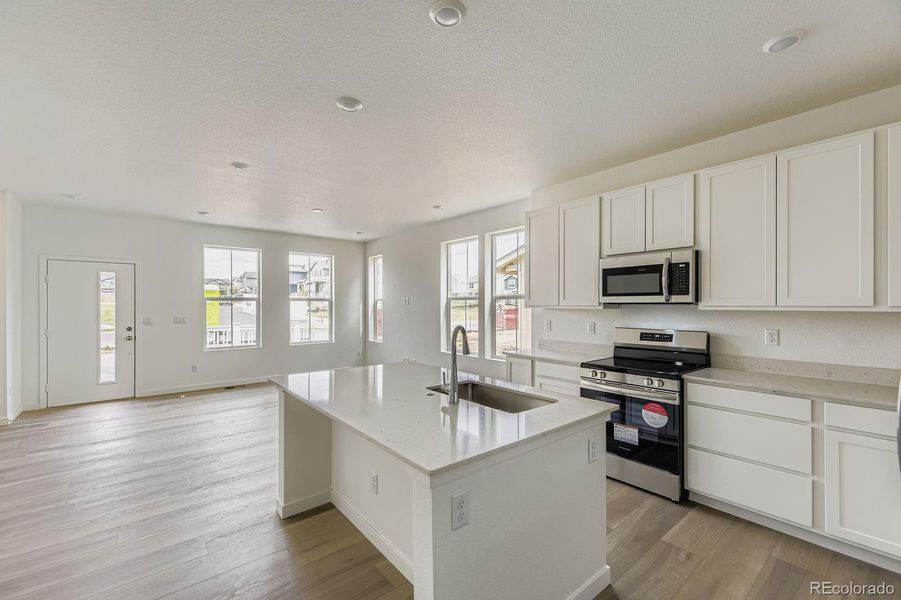 Furnished interior view inside a new home in Sky Ranch: Parkside Collection, Watkins (Image 7).