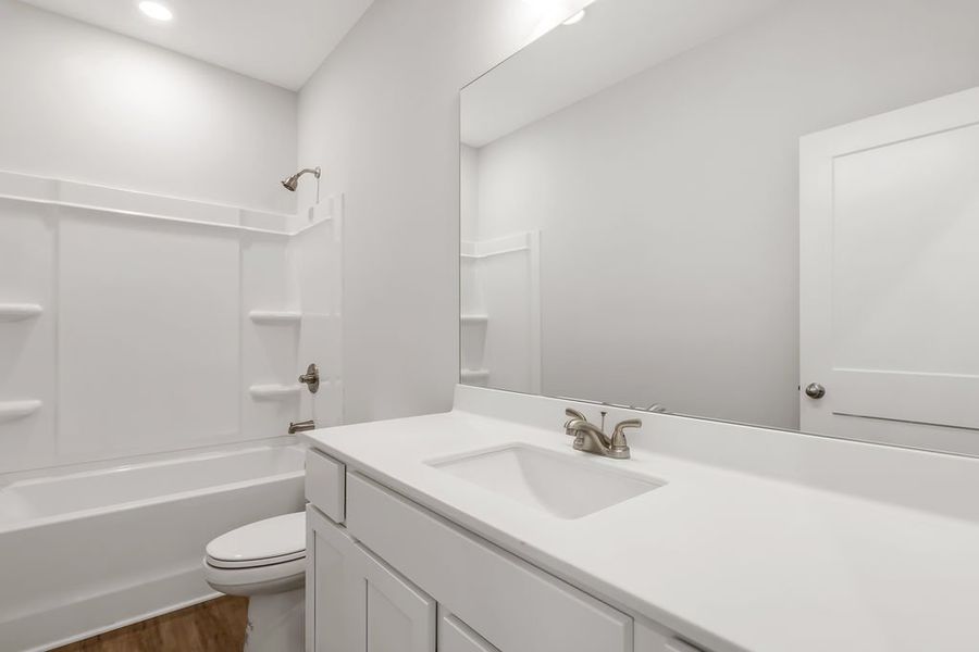 Representative furnished interior of a home built from the Emerson by UnionMain Homes in Maddox Landing, Hoschton (Image 11).