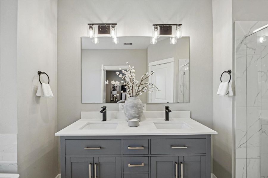 *Photos are of model home located in the community to reference finishes*