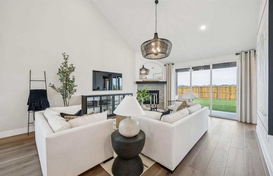 *Model Representation - Spacious gathering room with large windows