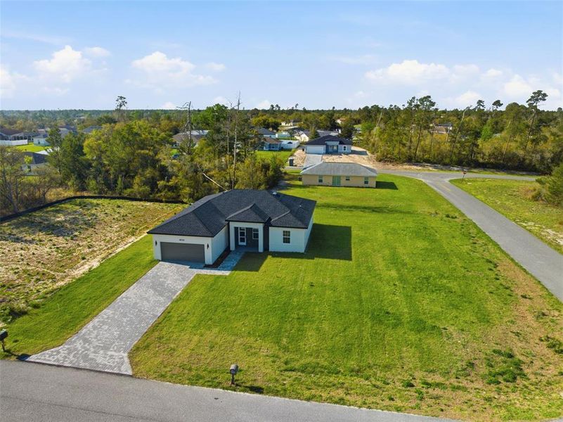 Front exterior of a new home in , Ocala, FL, highlighting curb appeal (Image 23).