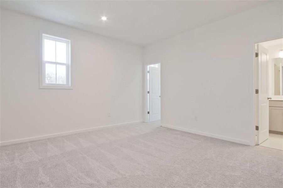 Spacious, unfurnished interior of a new home in The Paddocks at Doc Hughes, Buford (Image 28).
