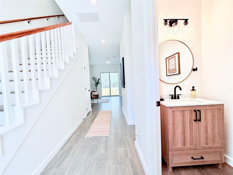 Furnished interior view inside a new home in , Conroe (Image 5).