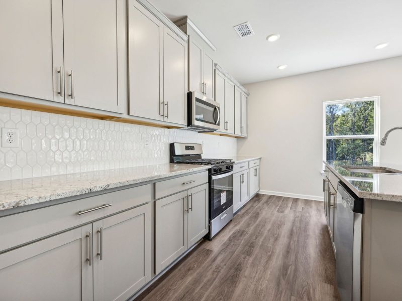 Furnished interior view inside a new home in Parkside at Grayson, Grayson (Image 4).